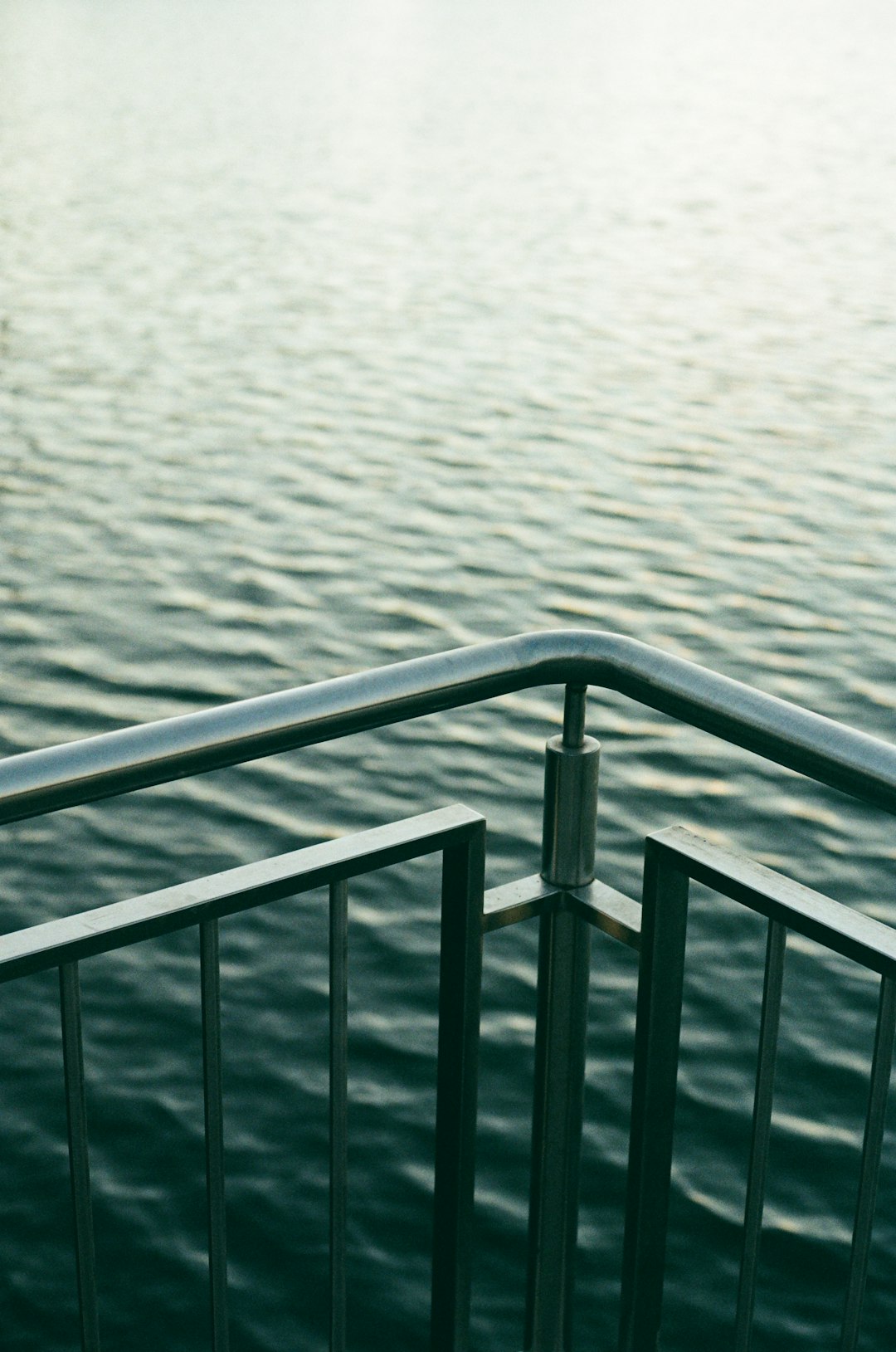 Mastering the First Impression: Your intriguing post title goes here a-view-of-a-body-of-water-from-a-railing-415zao2daww